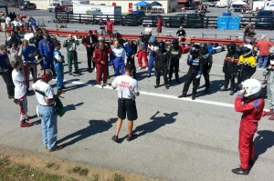 Race Director Brandon Taylor hosts a gathering of racers for the Saturday Race 1 drivers meeting (Photo: NCRM)