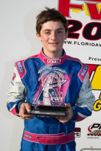 Brazilian Caio Collet - seen with RPG crew member Arie Ouimet - drove to a third in Mini Max (Photo: Studio52.us)