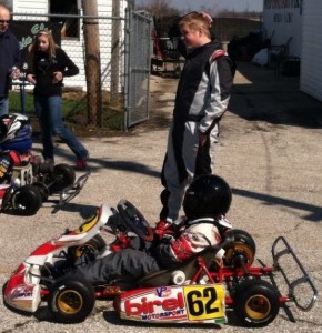 JHM Junior Supercan driver Bransten Peavler ponders the situation with team-mate Eli Fox (Junior Sportsman) on the grid at Whiteland (IN) Raceway Park (Photo: Carie Mottweiler)