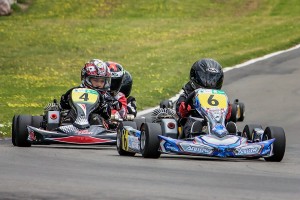Euan Dwyer (#6) and Tom Bewley (#4) are close in a Cadet ROK class race on Sunday (Photo: Fast Company/Vicky Jack)