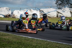 Seven-year-old Louis Sharp (#11) on his way to both a round and series class win in one of the Cadet ROK heats (Photo: Fast Company/Vicky Jack)