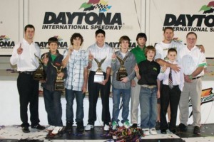 Kalish (black shirt on right) with the Franklin Motorsports / Merlin Nation in 2009