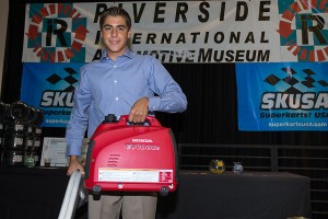 Carter Williams walking away with the Honda generator from the 2015 California ProKart Challenge banquet (Photo: dromophotos.com)