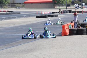 A wild finish ended with Daniel Inzunza flipping over and declared the winner in Mini Swift (Photo: KartRacerMedia.com)