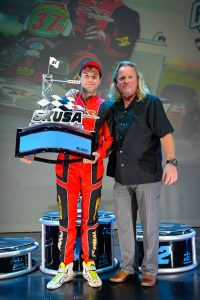 Formal with SKUSA CEO Tom Kutscher and the new 'Janowski' trophy for the S1 title (Photo: On Track Promotions - otp.ca)